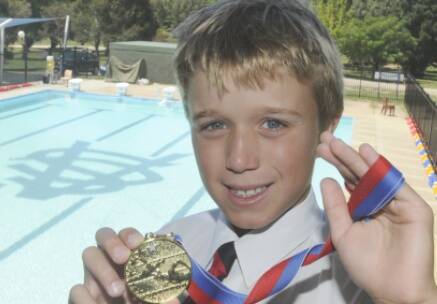 SUPER SWIMMER:  All Saints’ College swimmer Thomas Geyer readjusted the record books at the school's swimming carnival recently. Photo: CHRIS SEABROOK  022311ctom2