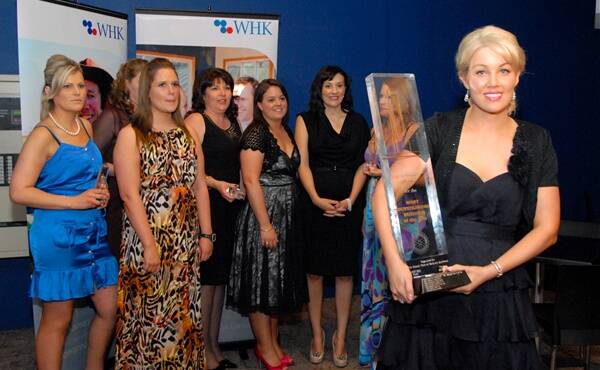 PEOPLE’S CHOICE: Macquarie Skin and Day Spa owner and manager (front) Karla McDiarmid with her team at Friday evening’s WHK Carillon Business Awards. Photo: ZENIO LAPKA                     092311zbiz3