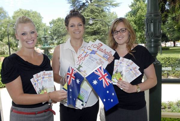 FLY THE FLAG: Council’s events team Emma Curtis, Hannah Welch and Michaella Press are really looking forward to this year’s Australia Day celebrations in Machattie Park. 011012passie