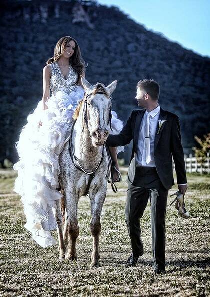 Riding high ... Kyly Boldy and Michael Clarke released photos of their Blue Mountains wedding on Twitter. Photo: Twitter