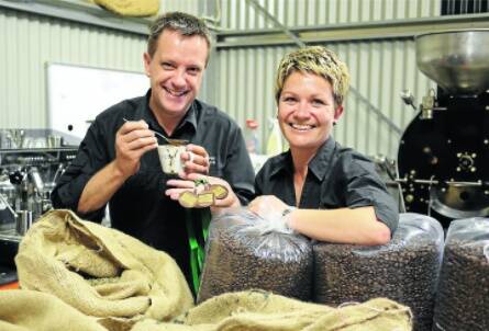 SILVER SMILES: Peter and Sonia Harrison at Fish River Roasters. 112510zcoffee1