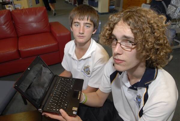 IS ANYBODY OUT THERE?: Bathurst High School students Ricky Daymond, 13, and James Sewell, 16, were due to fly to Ohkuma in three weeks’ time. They have been using Facebook to try to contact their Japanese friends in the city. 031611ptrip