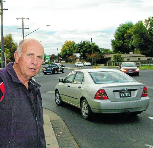 MORE PROBLEMS COMING: Brabham’s Outdoor Power Centre owner Clive Brabham on the busy intersection of Durham and Rankin streets. Photo: ZENIO LAPKA 042811zbrabham
