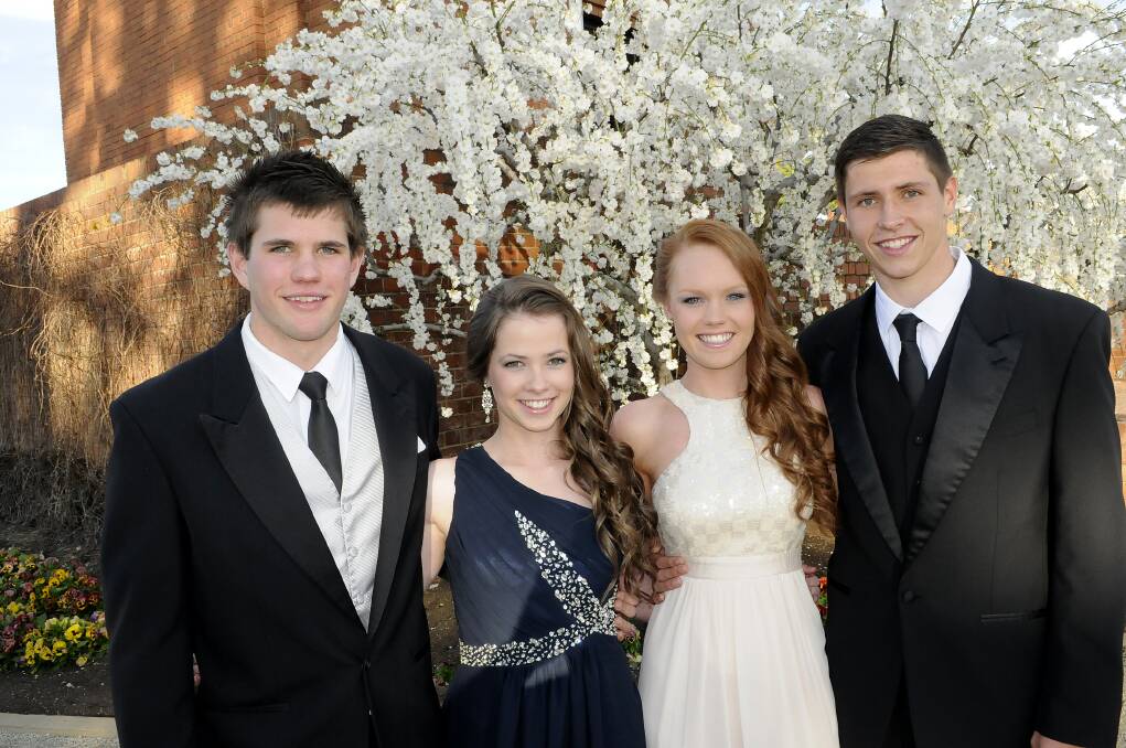 ELEGANT: Jakob Hill, Harriet Crowley, Olivia Harvey and Jaymen Carter were among the guests at the St Stanislaus College graduation ball. 	092113cssc2