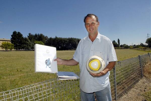 BIG PLANS: Sporting enthusiast Tony Thorpe on the site of his proposed football education centre on Alpha Street. Photo: PHILL MURRAY 011712ptony