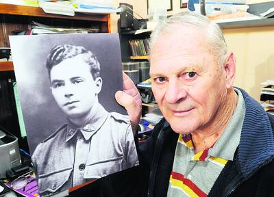 CLOSURE: Barry Konemann with a picture of his cousin, Sergeant Ernest Augustus Jentsch, who was killed during the battle of Fromelles.Photo: PHILL MURRAY 050710pbarry