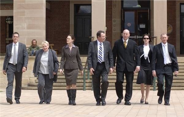 OPEN FINDING: Pictured leaving Bathurst Court House yesterday are (from left) Acting Superintendent Peter Houlahan, counsel assisting Chris Ronalds SC, Crown solicitor Emma Bailey, assisting counsel John Chicken, Detective Acting Inspector Guy Flaherty, Detective Senior Constable Kate Bourke and Detective Acting Sergeant Rick Brest. Photo: ZENIO LAPKA 092109zvaughn7