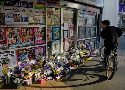 Tributes left at the newsagency.