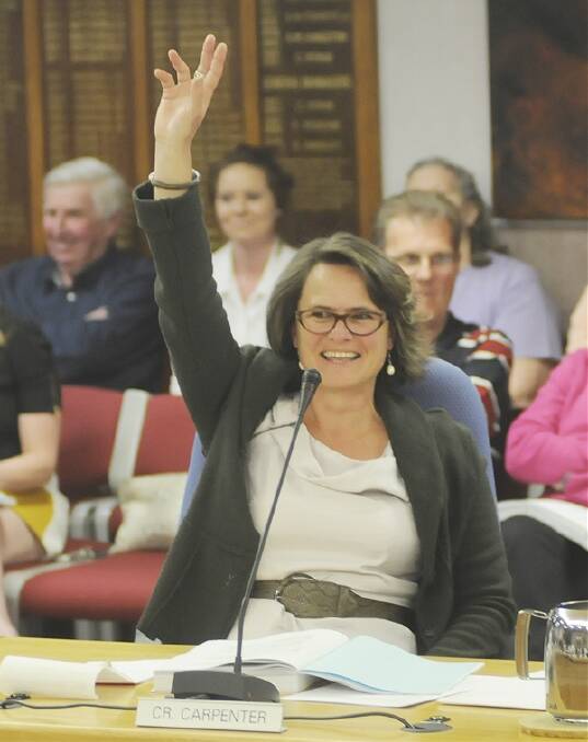 I DON'T BELIEVE IT: Cr Tracey Carpenter casts the vote that saw her become Deputy Mayor of Bathurst on Wednesday night. Photo: CHRIS SEABROOK 092111cmayor18