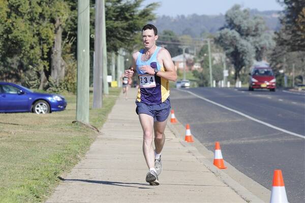 READY TO BURN: Martin Timms will join a group of fellow Bathurst runners in contesting tomorrow’s Canberra Marathon. They include first-timer Russell Riepsamen. Photo: CHRIS SEABROOK 	050210cmara5