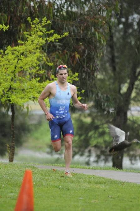 COMING HOME: Nick North, who is in great form, will be racing in his first Bathurst Australia Day triathlon meet today. Photo: CHRIS SEABROOK 102410ctri9c