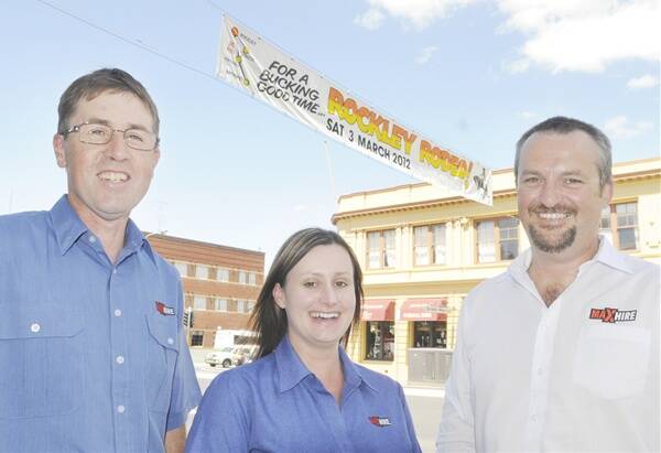 YEEHAH: Max Hire has come on board as sponsor of the Rockley Rodeo. Pictured are Brad Hargans, branch manager Shelley Ovenstone and Murray Dawson. Photo: CHRIS SEABROOK 020612crodeo2