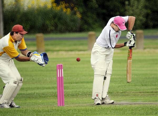 GOING, GOING, GONE: John Rudge edges one behind to Rugby Union wicketkeeper and captain Scott Johnston who makes no mistake during their clash on Saturday at Morse Park 1. Photo: PHILL MURRAY 022011prudge1