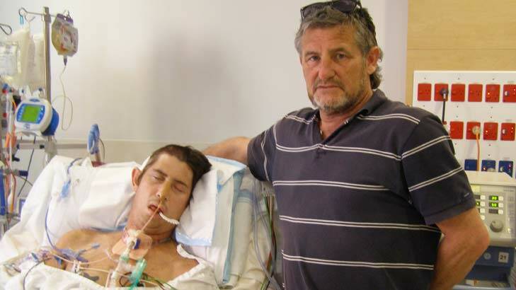 Looking for answers: Peter Mitchell with son Matthew before his death. Photo: NSW Police Media Unit