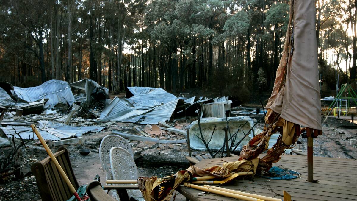 The ruins of a home in Kinglake destroyed during bushfires. Photo: PENNY STEPHENS