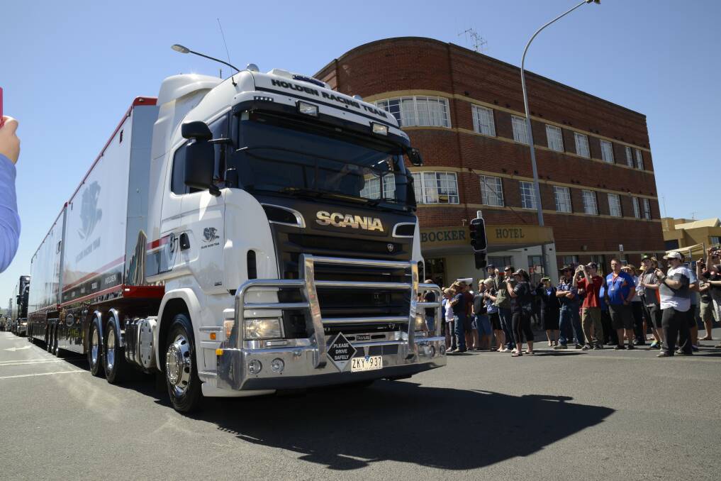 The V8 Supercar Transporter Parade saw the V8 Supercars make a spectacular entrance when they roared into Bathurst with the impressive B-Double parade on Wednesday. Photo: Phill Murray.