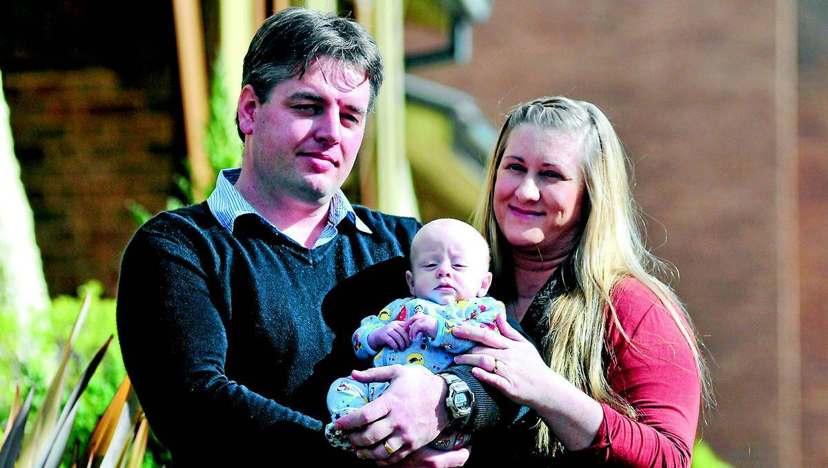 ORANGE: Josh and Janine Gallagher did not think they would have any more children after their triplets died but then baby Ethan was born. Photo: JUDE KEOGH