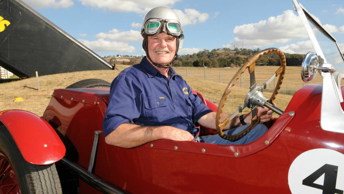 VIP PASSENGER: Norm Rutherford from Bathurst Regional Council will be in the hot seat when he takes Governor General Quentin Bryce on a lap of Mount Panorama in the 1951 George Reed Special during her visit to the city next Tuesday. Photo: Zenio Lapka. (Flick across to see more photos of Norm getting ready). 
