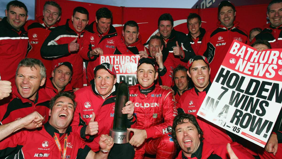 2005: Mark Skaife and Todd Kelly (centre) of the Holden Racing Team celebrate their win with team members after the Bathurst 1000. Photo: Getty Images. 