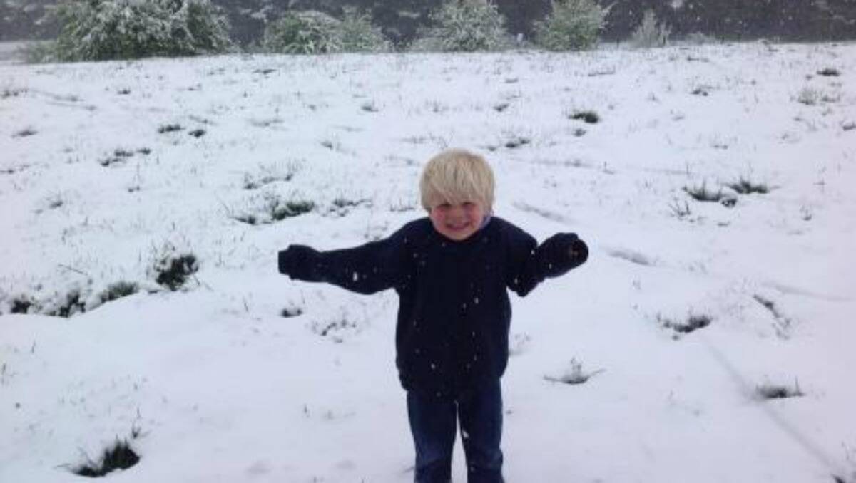 SNOW: Nicholas Newman enjoying the October snow fall. Photo: Bobby Newman via Facebook. 