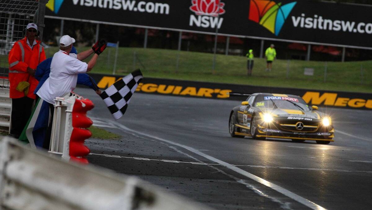 The Erebus Racing car crosses the finish line to win the 2013 Bathurst 12 Hour. Photo: Nathan Wong