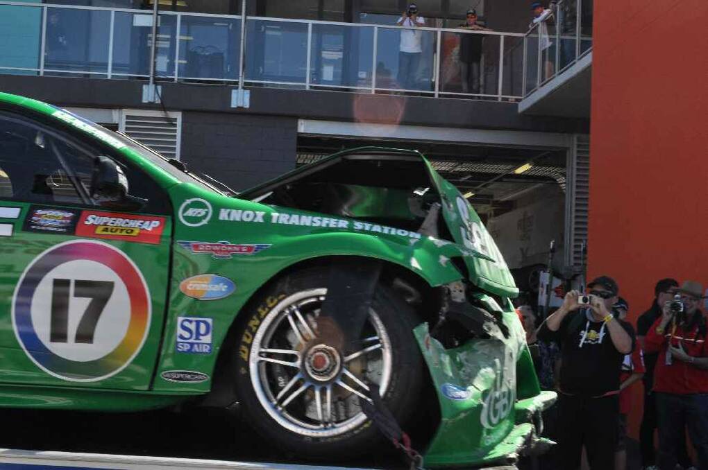 Chaz Moztert's Wilson Security Racing team car after his crash at the top of Mount Panorama during the fifth practice session for the V8s.