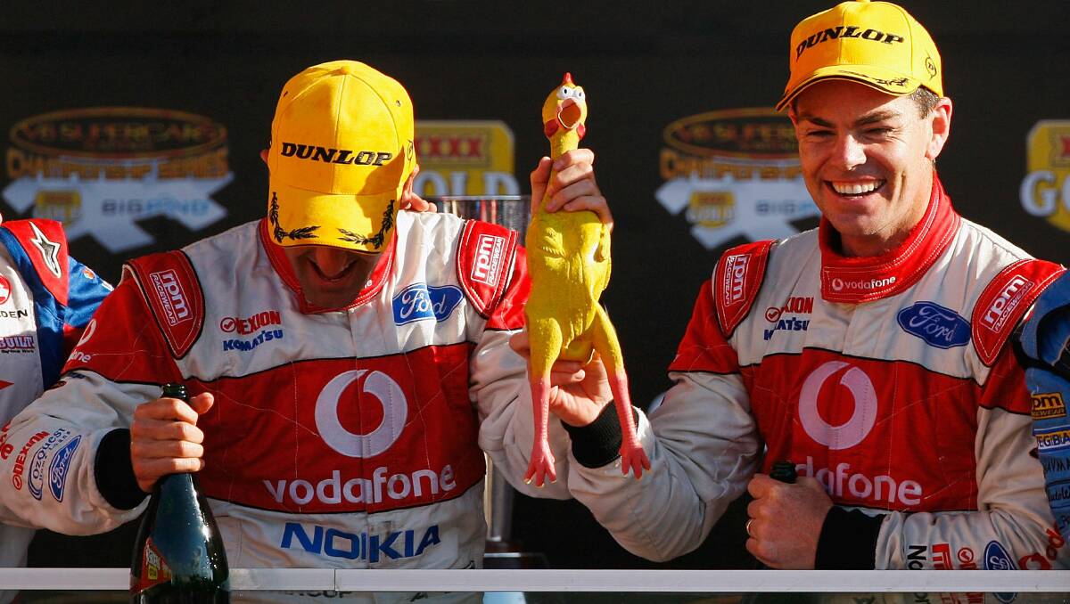 2008: Jamie Whincup and Craig Lowndes of Team Vodafone celebrate after winning the Bathurst 1000. Photo: Getty Images. 