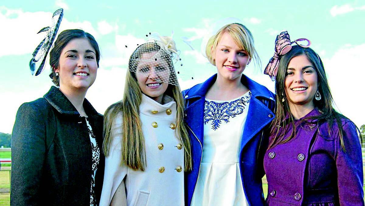 COWRA: The gates have just closed for another year but the Cowra Picnic Races committee is already looking ahead to an bigger event in 2014. Pictured are Stacy Bokeyar, Zoe and Holly Harrison and Nicole Bokeyar, Cowra at the Cowra Picnic Races.