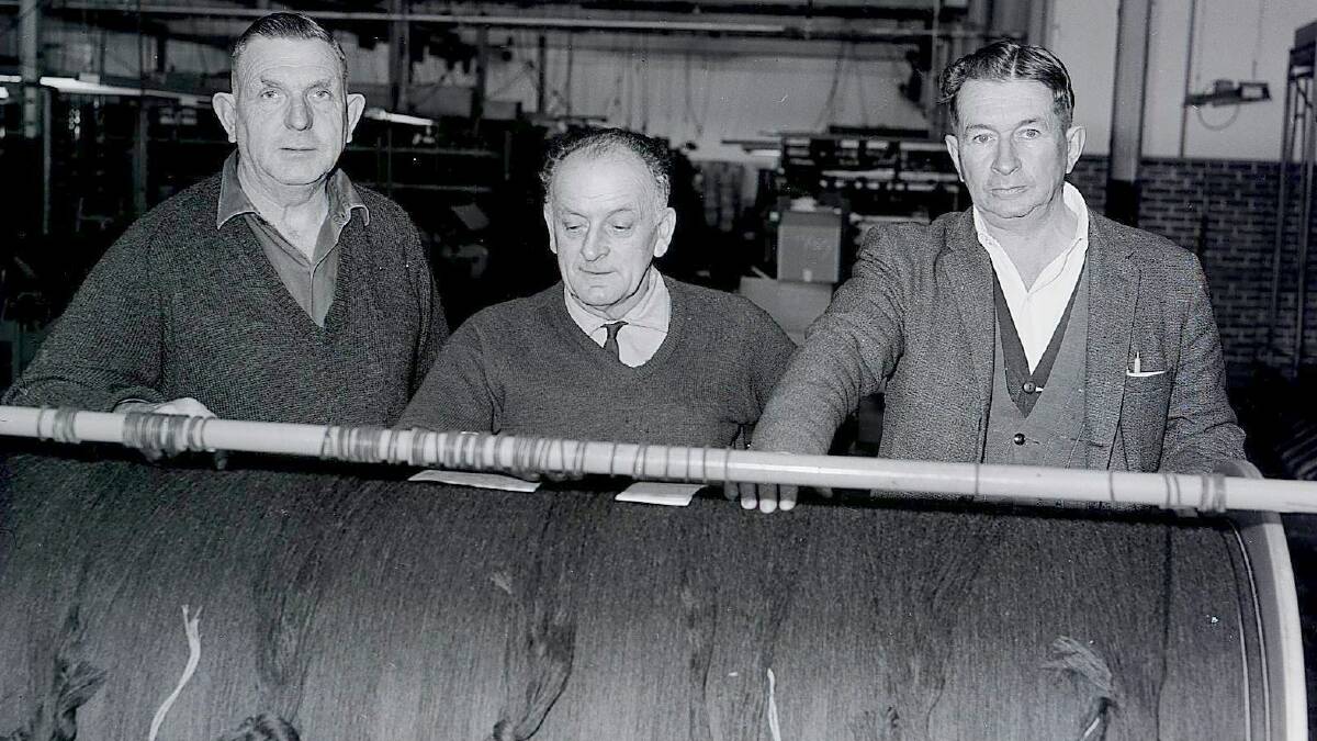 Among the staff at Macquarie Worsteds factory were assistant weaving manager George Singer, weaving manager Sid Mills and warping foreman Roy Bowman, who between them had given 100 years’ service to the company, July 1967  Photo: CWD Negative Collection, Orange & District Historical Society.