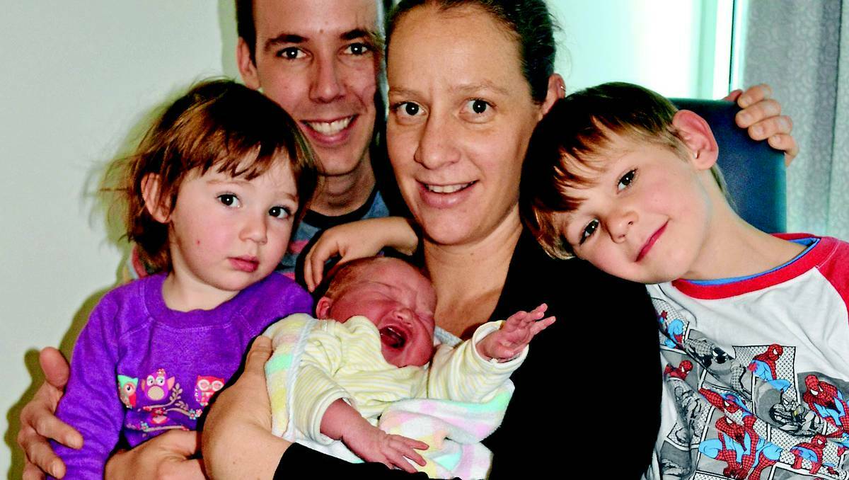 BATHURST: Bathurst’s own little princess – baby Juliet Isolina Riepsamen – is pictured yesterday morning with beaming mum Domenica Russo, dad Russell Riepsamen and siblings Marcus, 4, and Anneka, 2. Photo: BRIAN WOOD	 072313royal1