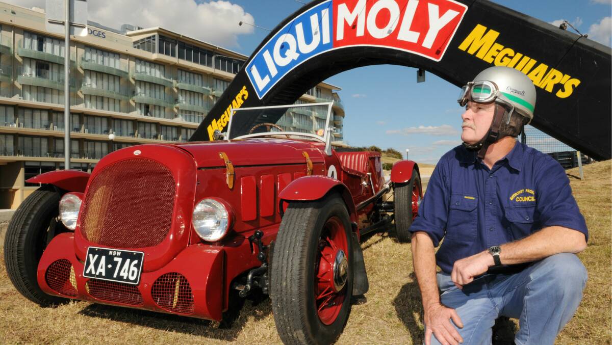 VIP PASSENGER: Norm Rutherford from Bathurst Regional Council will be in the hot seat when he takes Governor General Quentin Bryce on a lap of Mount Panorama in the 1951 George Reed Special during her visit to the city next Tuesday. Photo: Zenio Lapka. (Flick across to see more photos of Norm getting ready). 