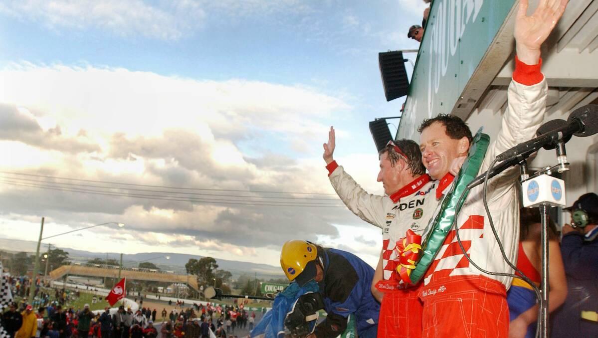 2001: Mark Skaife (left) and driving partner Tony Longhurst celebrate after winning the Bathurst 1000. Photo: Getty Images