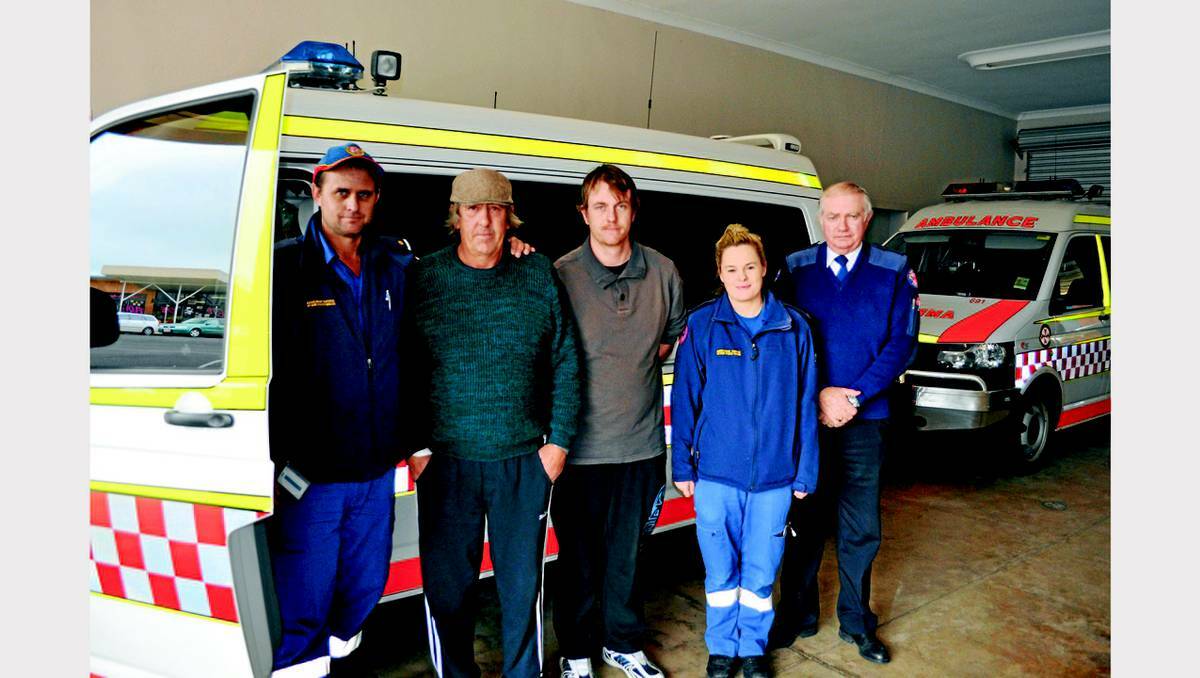PARKES: Brett Frame and his son, Ricky sought out the local paramedics who tried to save their son and brother, Matt Frame on the weekend to express their thanks for their efforts. 