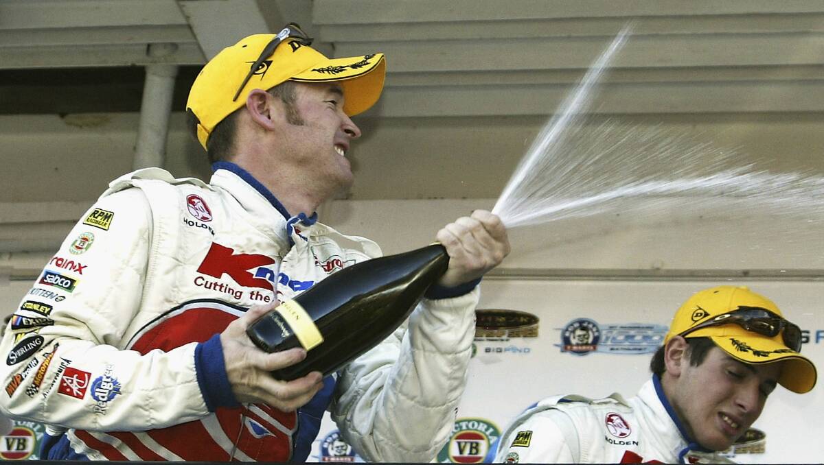 2003: Greg Murphy of the K-Mart Racing Team celebrates winning the Bob Jane Bathurst 1000. Photo: Getty Images