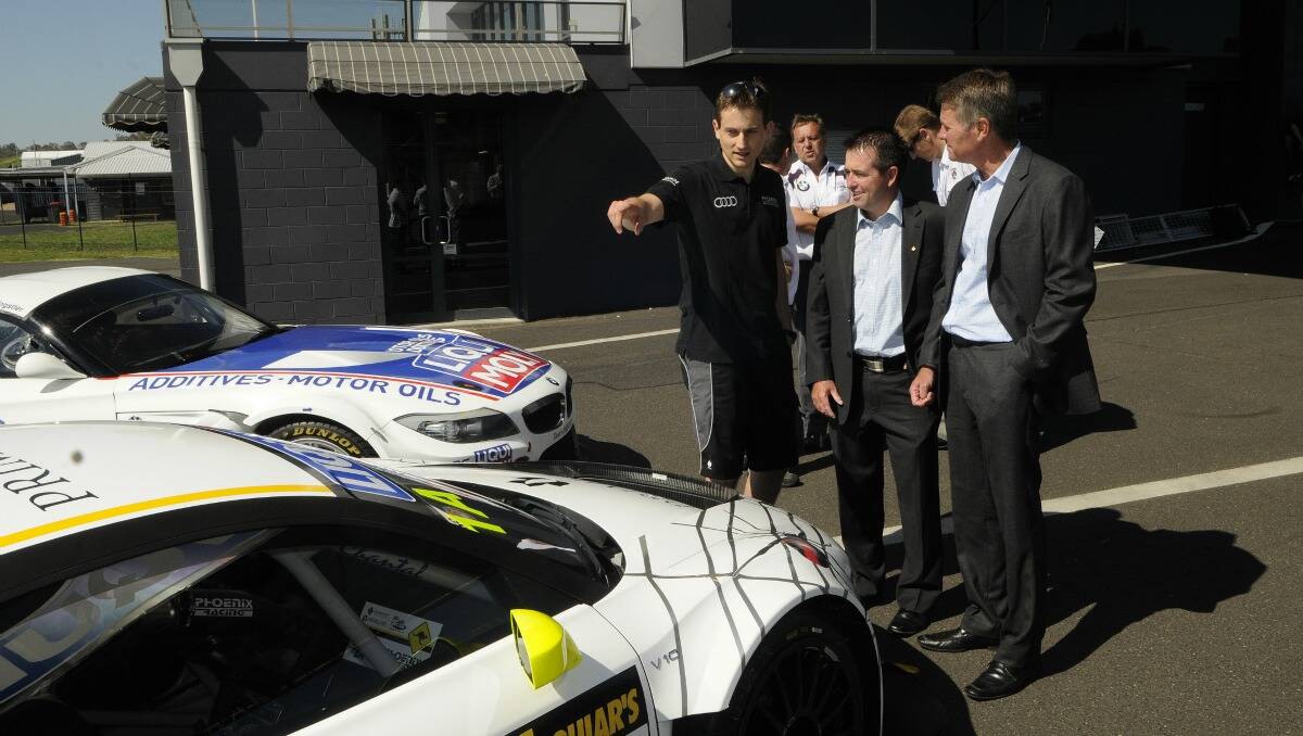 FULL SUPPORT: Paul Toole and Andrew Stoner with Phoenix Team manager Bernard Demmer at Mount Panorama. 