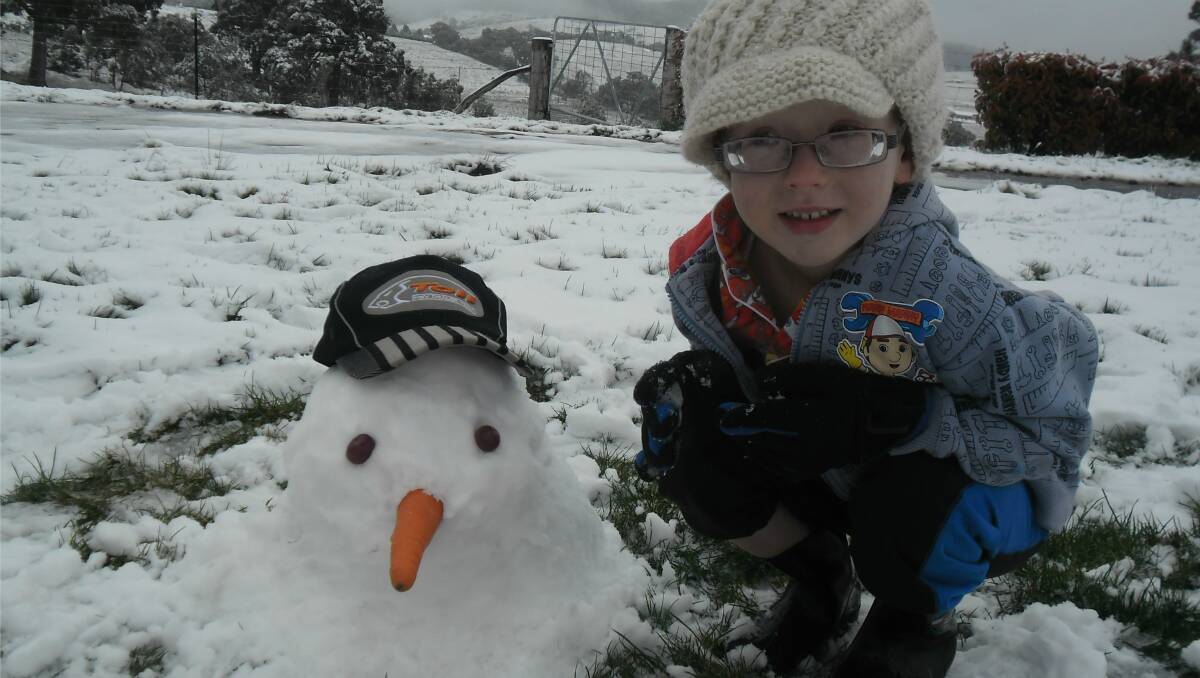 SNOW: Photos of snow at our house in Limekilns. My son Ben Graham is seen with the snowman head we made.It was too cold to make the rest of his body. Photo: Carrie Graham. 