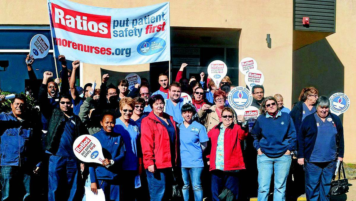 ORANGE: Nurses take strike action.
