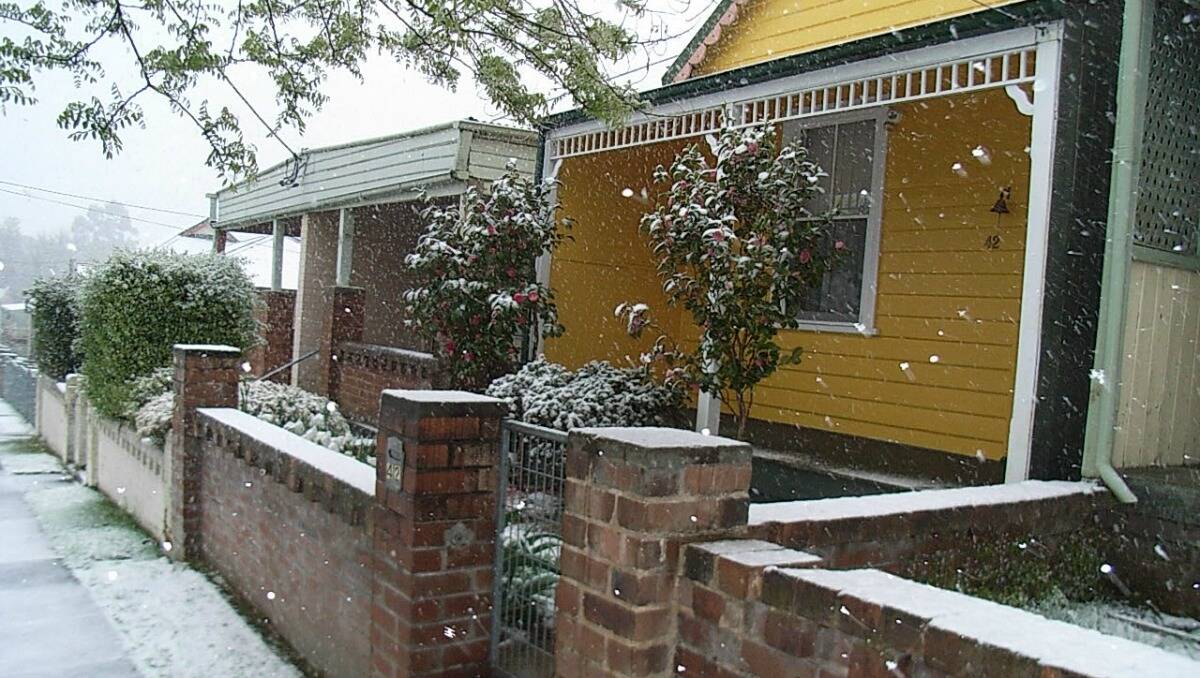 SNOW: Bant Street Lithgow this morning. Photo contributed. 