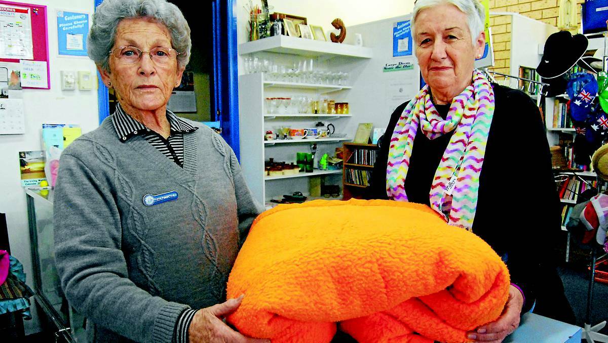 COWRA: Rising electricity prices are forcing more people to find cheaper ways to stay warm this winter buying blankets from Cowra's St Vincent de Paul shop.