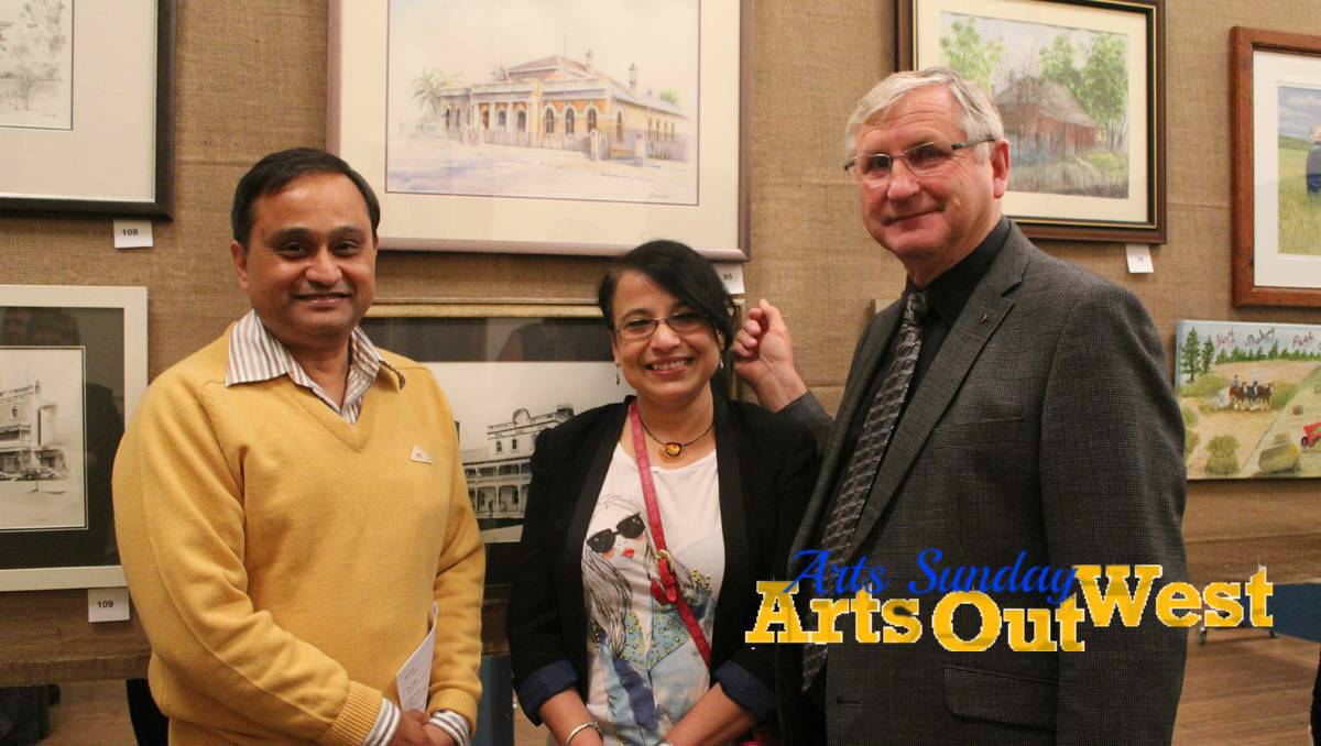 Local artist Sampa Bhakta (centre) with her husband Jay and Mayor of Forbes Shire Councillor Ron Penny.