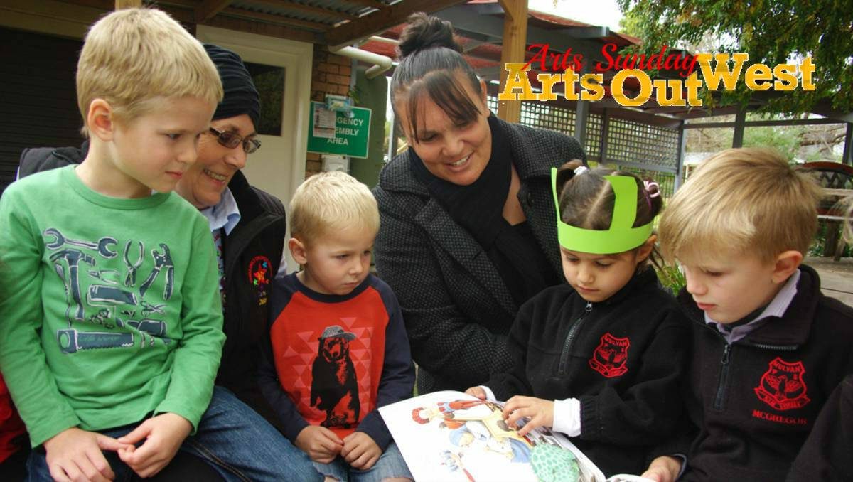 ABSORBED: Carinya Early Childhood Centre's Brodie Whitty, Drew Langfield and Deidre Healy read The Wrong Book with Mulyan Public School's Beatrice Murray, Jessi-May Williams and Digby Macgregor.