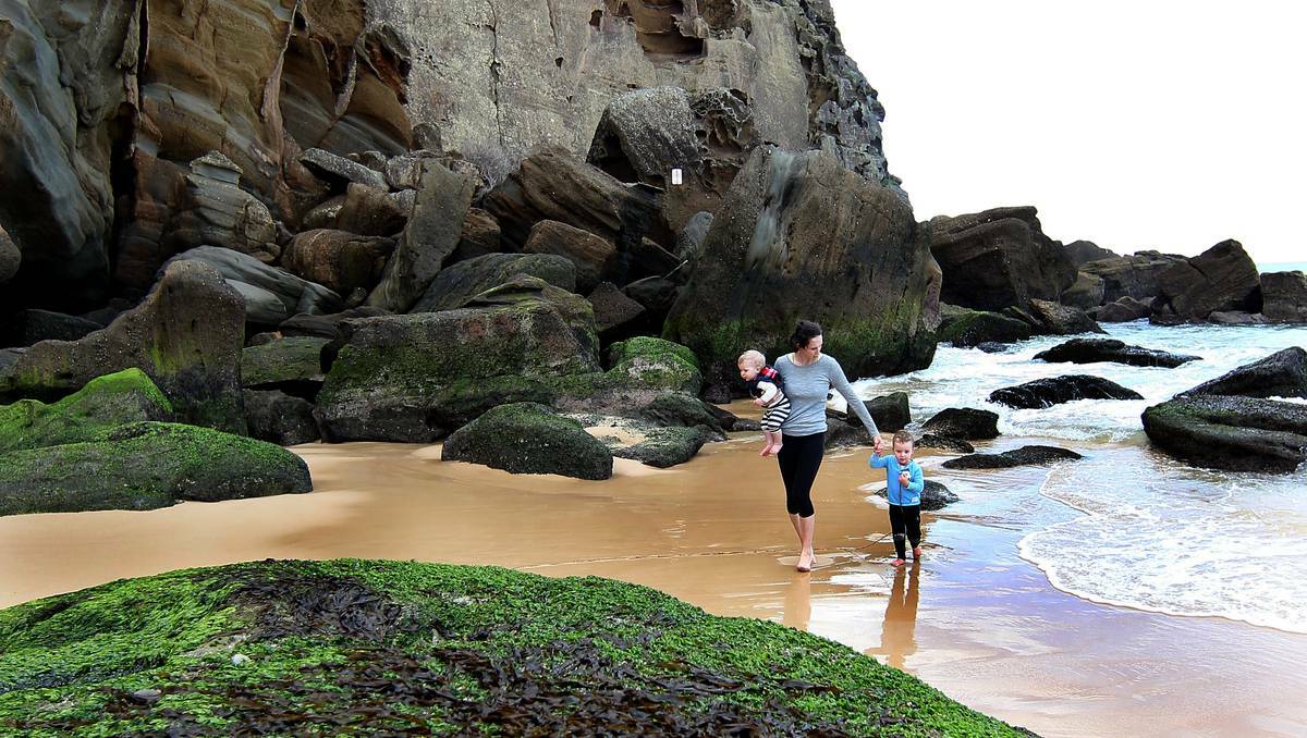 Lesley Irvine with her children at Redhead Beach. Picture: Phil Hearne, Newcastle Herald