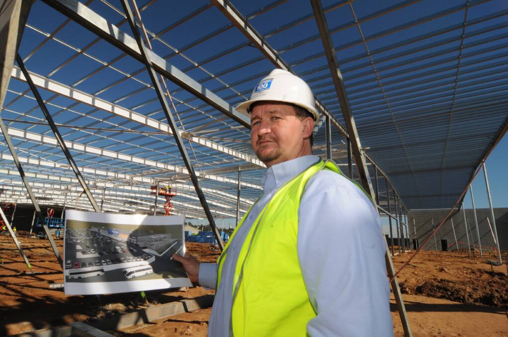 AUGUST: Local site manager Wayne Syrch on location at the massive Masters Home Improvement centre at Kelso. The main building is about the size of one-and-ahalf football fields. Photo: ZENIO LAPKA 072513zmasters3