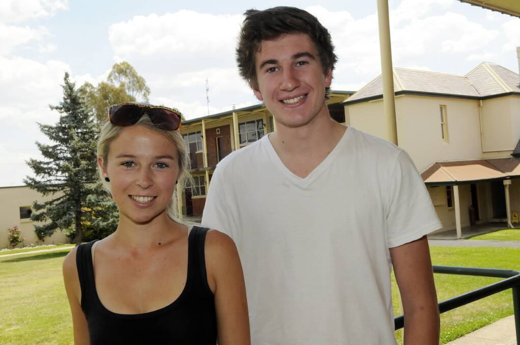 MOVING ON: The Scots School’s Else Owens and Lachlan Conyers. Photo: PHILL MURRAY 121813pscots