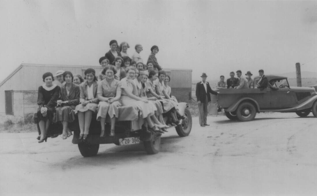 LIFT HOME: Edgell employees pack onto vehicles to be dropped home following their shift in 1937. 060713edgells5