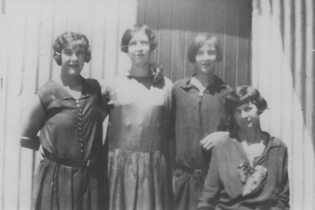 IN ARMS: Annie Bourke, Jean Niel and Mary Curtain with Mrs Fox outside the first Edgell cannery around 1928-29. 060713edgells3
