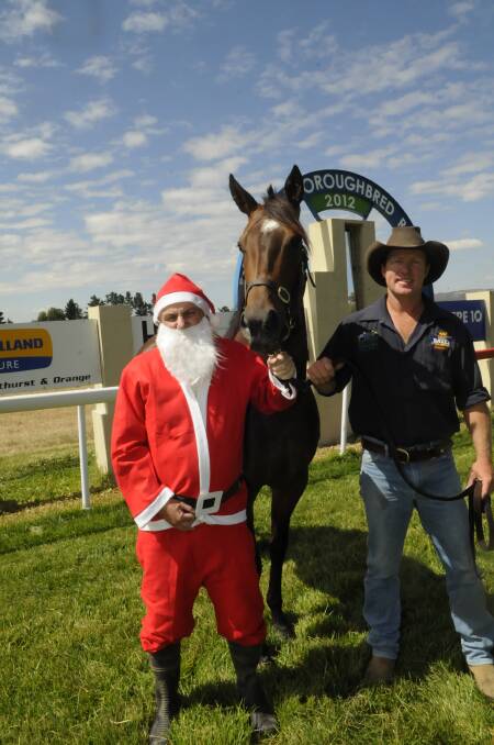 2012: Santa goes to the races. 