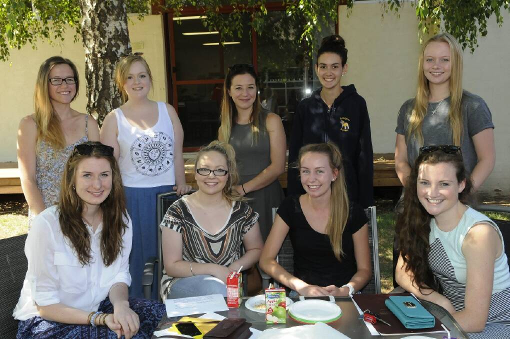 SNAPPED:  MacKillop  College students Rose Mckenna, Charlotte Foster, Ashleigh Crook, Rebecca Harris and Brooke Alexander,  with Julia O'Shea, Aisha Smith, Jenny Fitzsimmons and Dominica Condon. 121813pmac1   