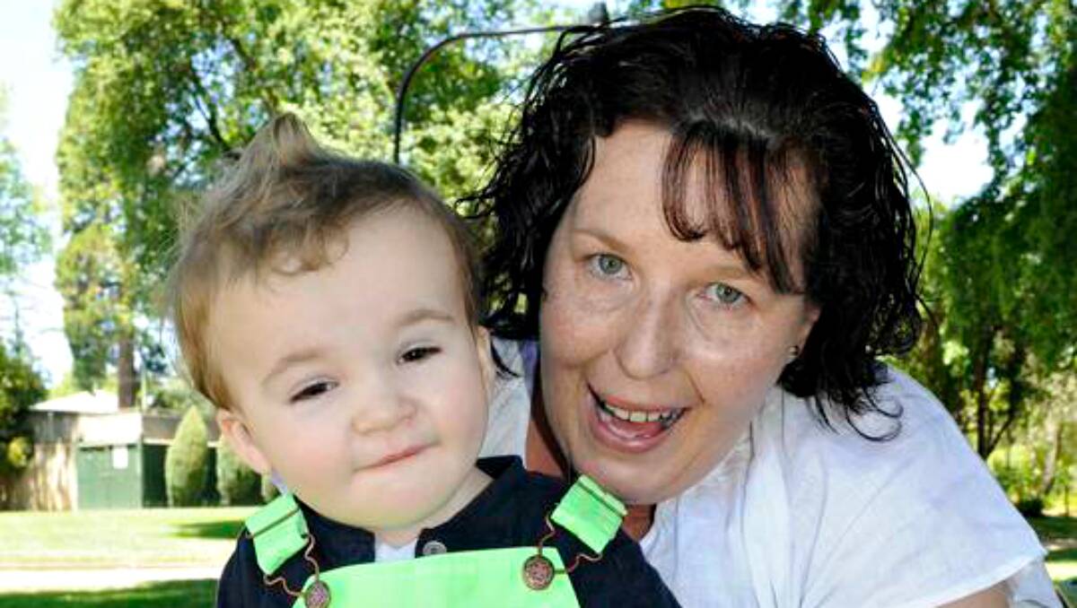 FURIOUS: Sonia Nunan and her son Darcy. Mrs Nunan is furious her son is missing out on vital treatment because a paediatric physiotherapist’s position remains vacant.	 112613cdarcy