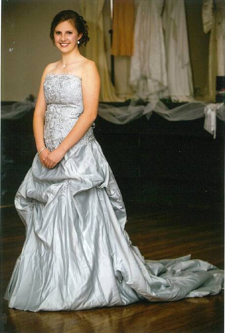 2010: A beautiful dove grey satin strapless dress with silver lace and beading on the bodice, which had a dropped waistline. Worn by Kerryl Tobin at her wedding and worn on the night by her cousin Tiarna Elliott.